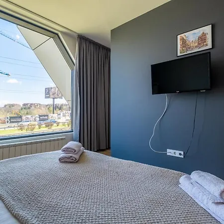 Daire Arcadia Apartment, Park And Parking