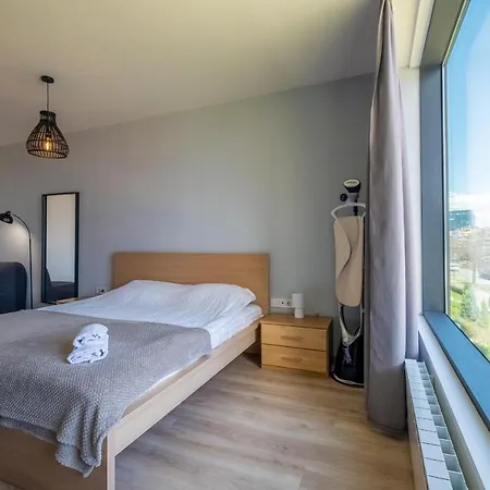 Daire Arcadia Apartment, Park And Parking